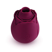 A purple rose-shaped clitoral vibrator with two buttons.