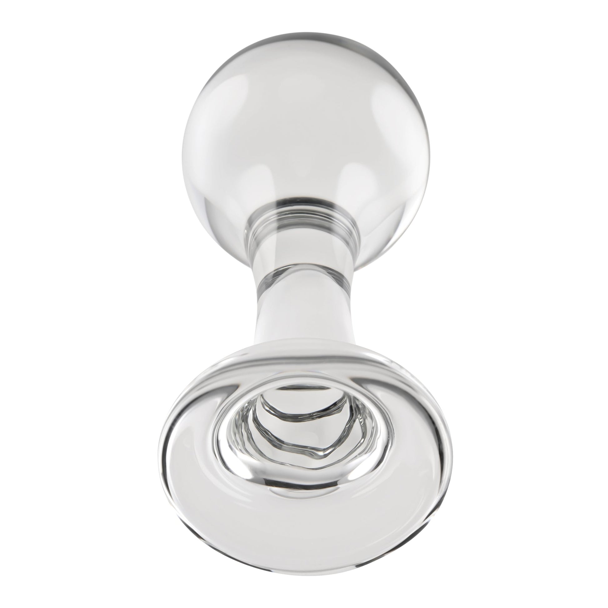 Clear glass anal plug with a spherical tip and a wide base.