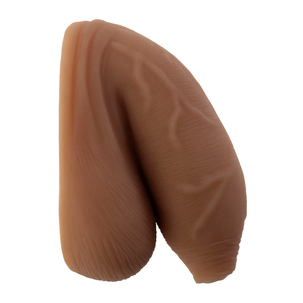 Uncircumcised soft TPE packer with realistic veins and wrinkles.
