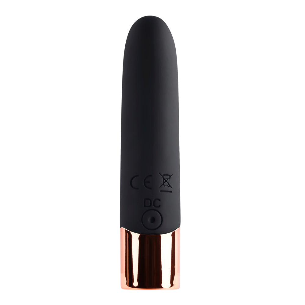 Black silicone bullet vibrator with rose gold accents and CE DC markings.