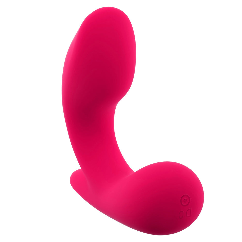 A pink curved vibrator with a bulbous head and a DC power symbol.