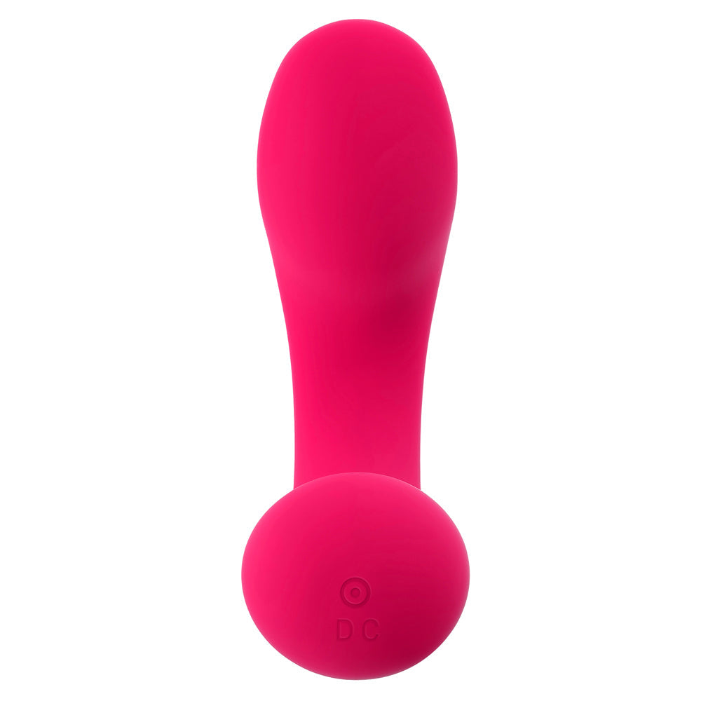 A pink vibrating prostate massager with a rounded base.