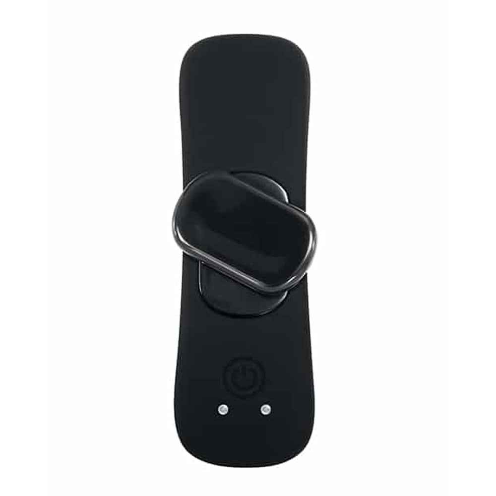Black remote-controlled magnetic underwear vibrator with a power button.