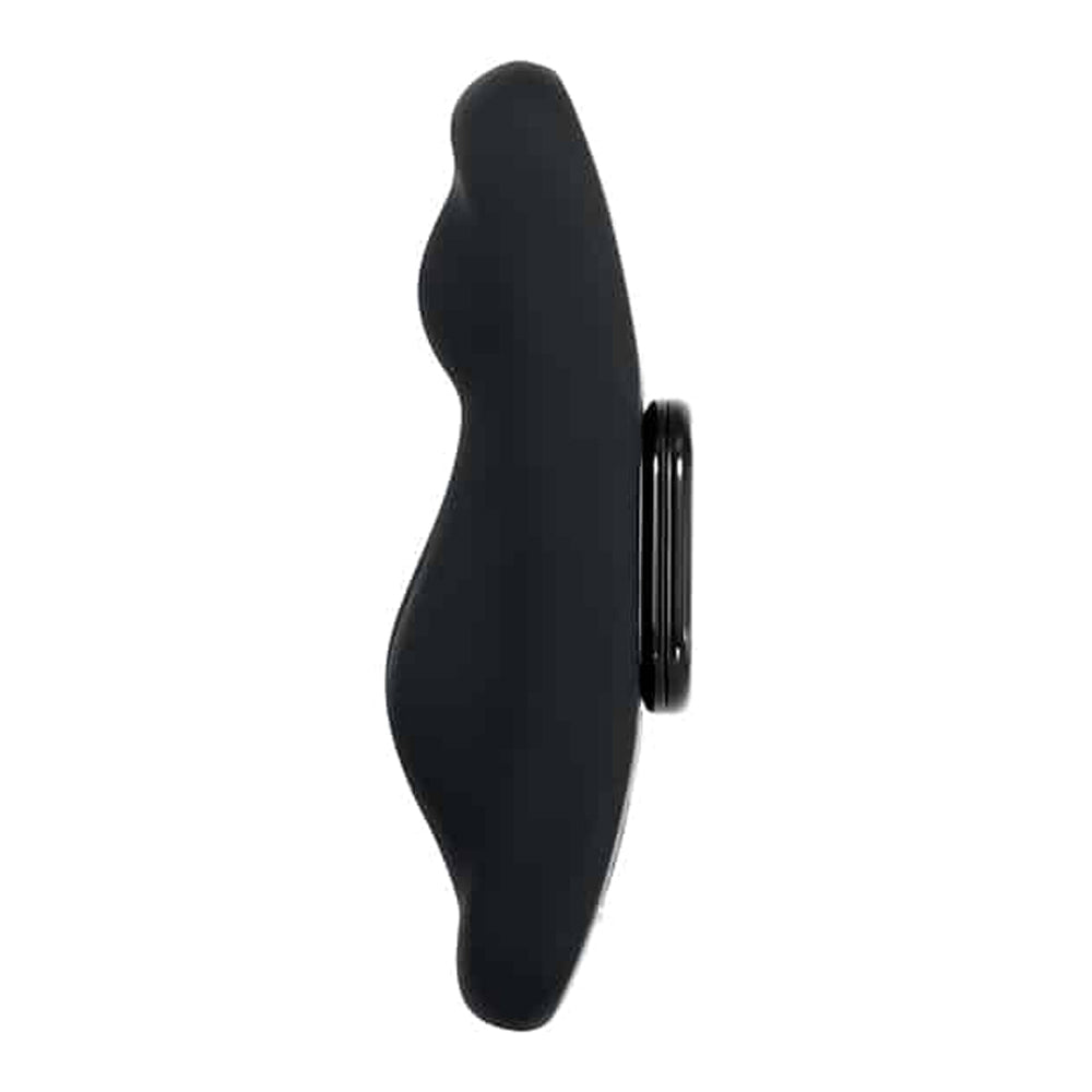 Black remote-controlled magnetic underwear vibrator with a curved shape.