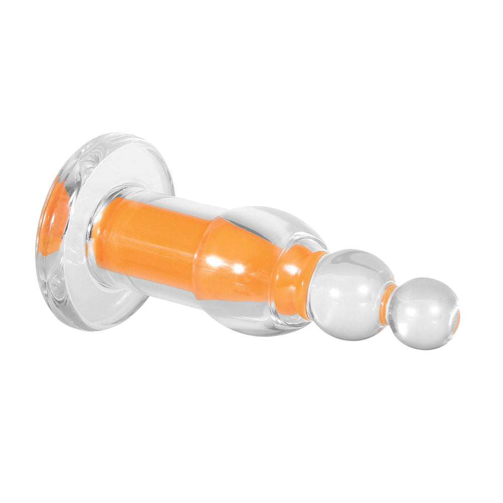 Clear beaded plug with orange insert and remote control.