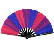 A large folding hand fan with bisexual pride colors.