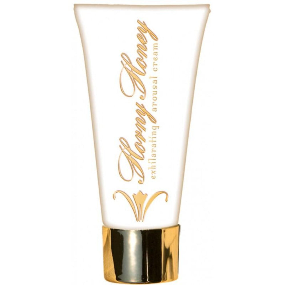 A white tube of Horny Honey arousal cream with gold lettering and a gold cap.