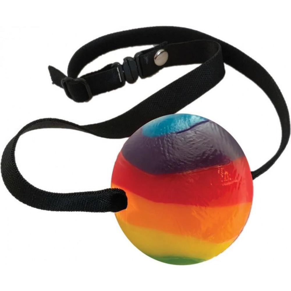 Rainbow candy ball gag with an adjustable black strap.