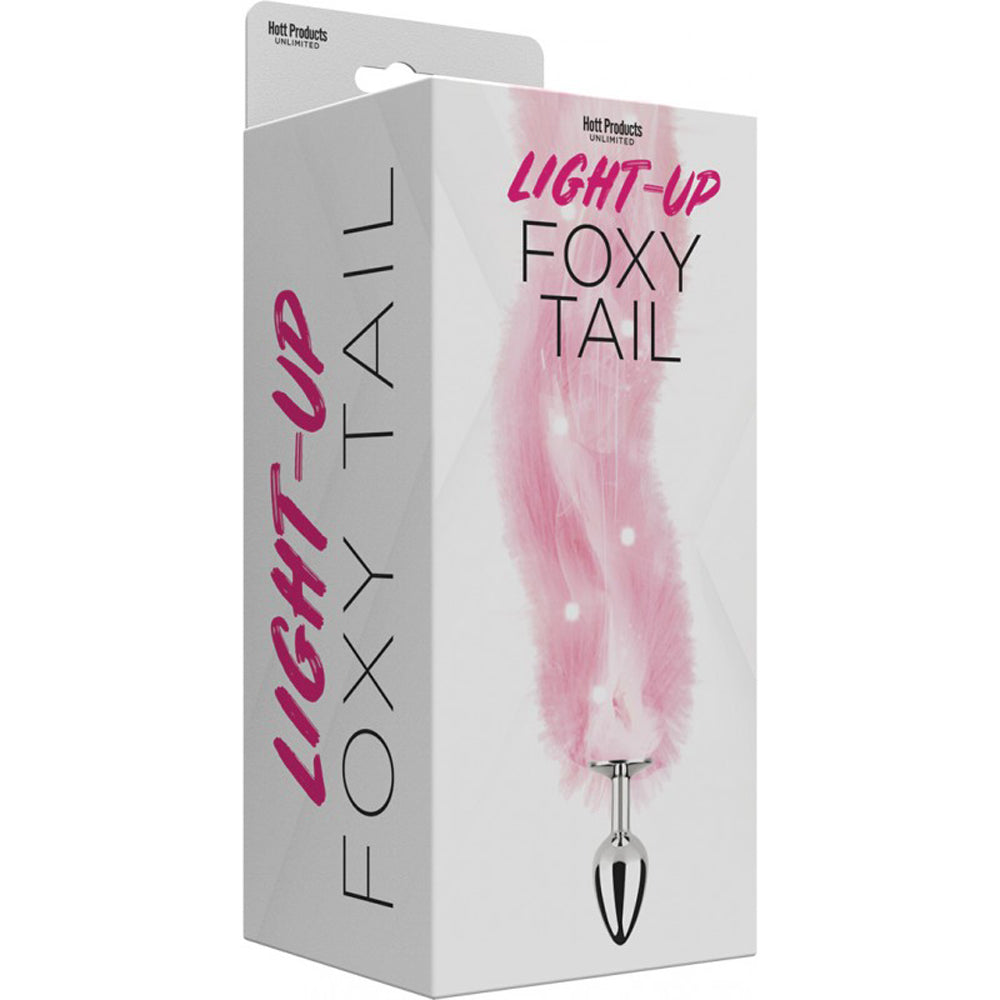 A light-up foxy tail anal plug with pink fur and a silver base.