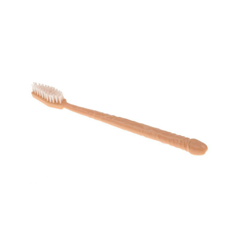 A novelty toothbrush with a pecker-shaped handle and medium bristles.