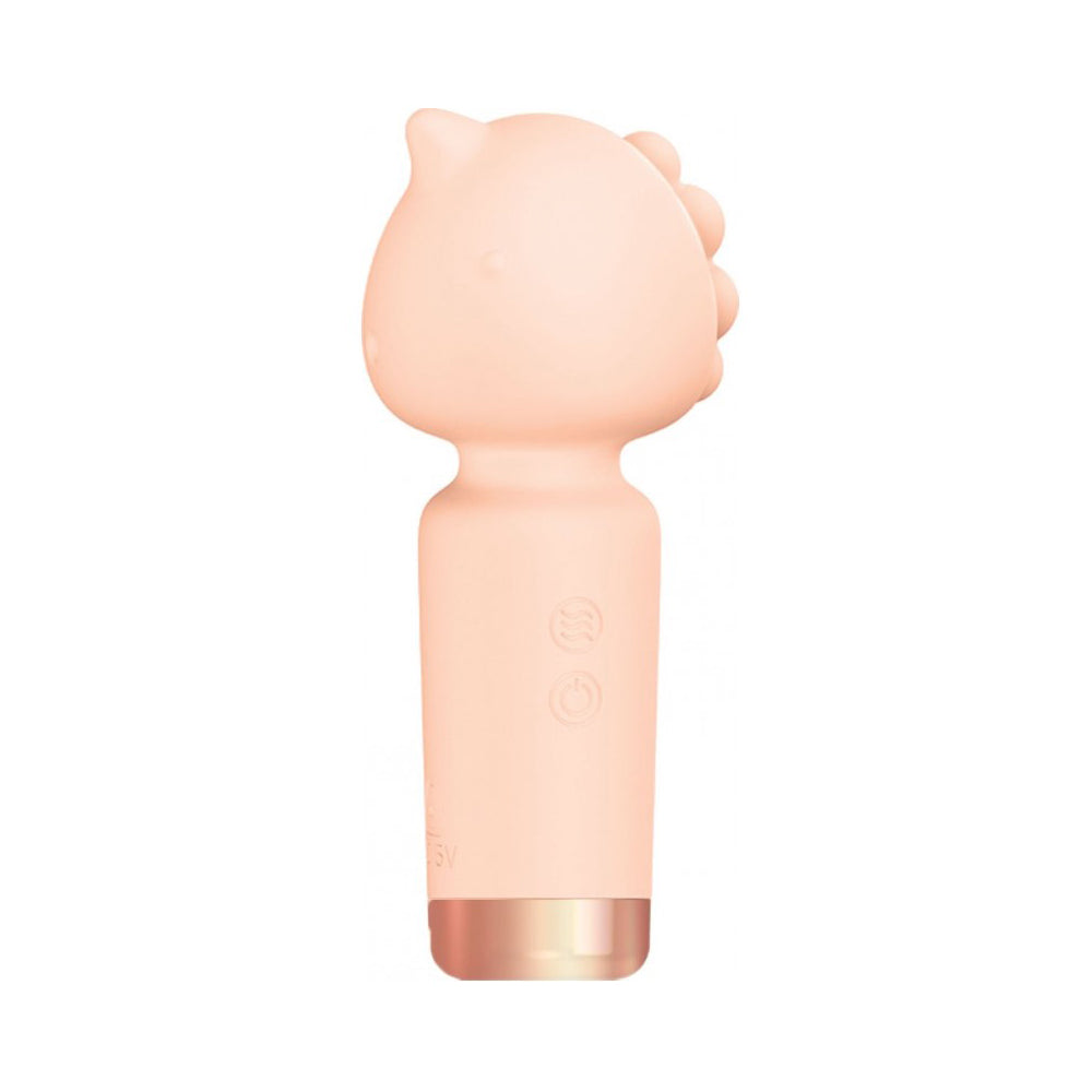 A peach-colored silicone vibrator with a beak-like top and rose gold base.