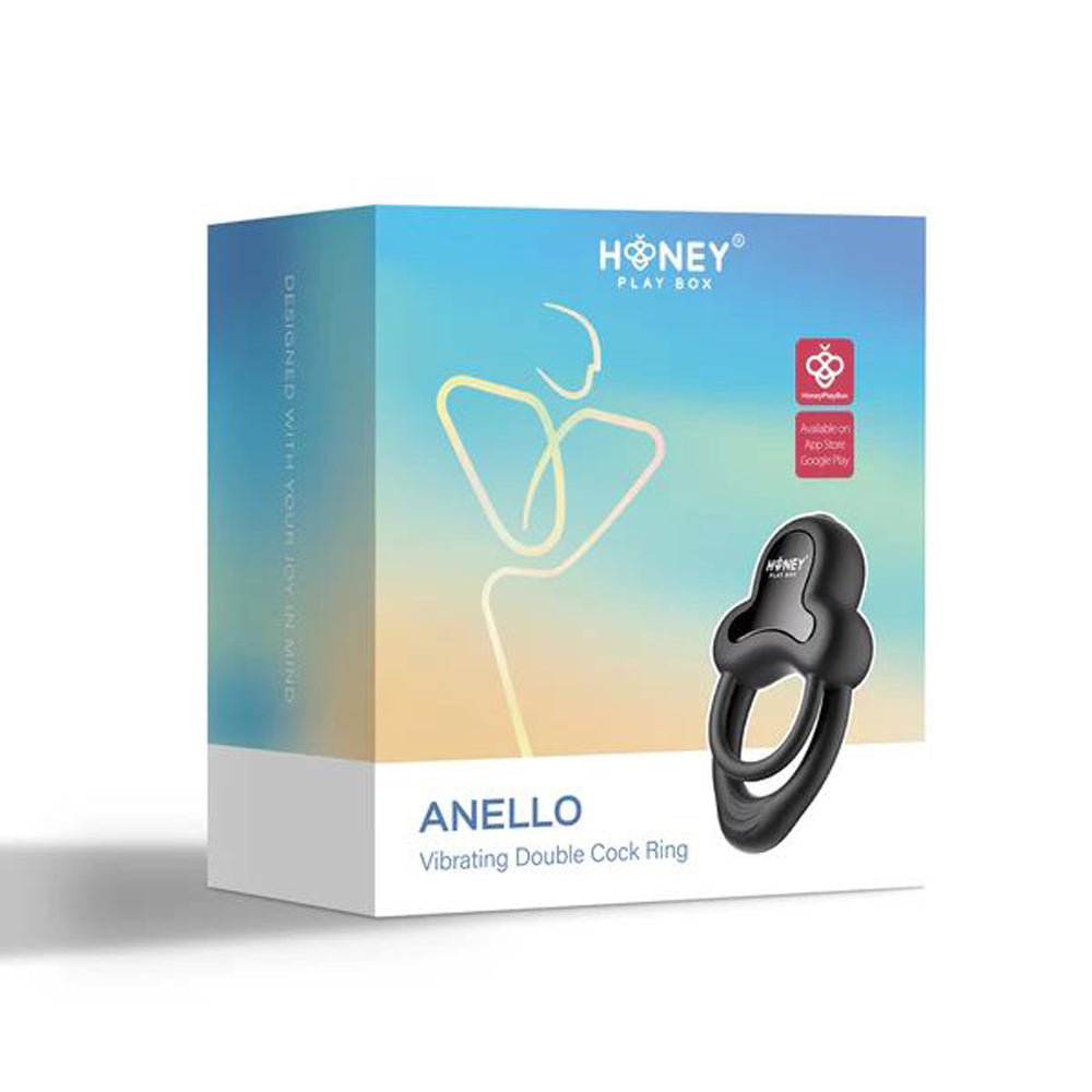 A black double cock ring with the Honey Play Box logo on a product box.