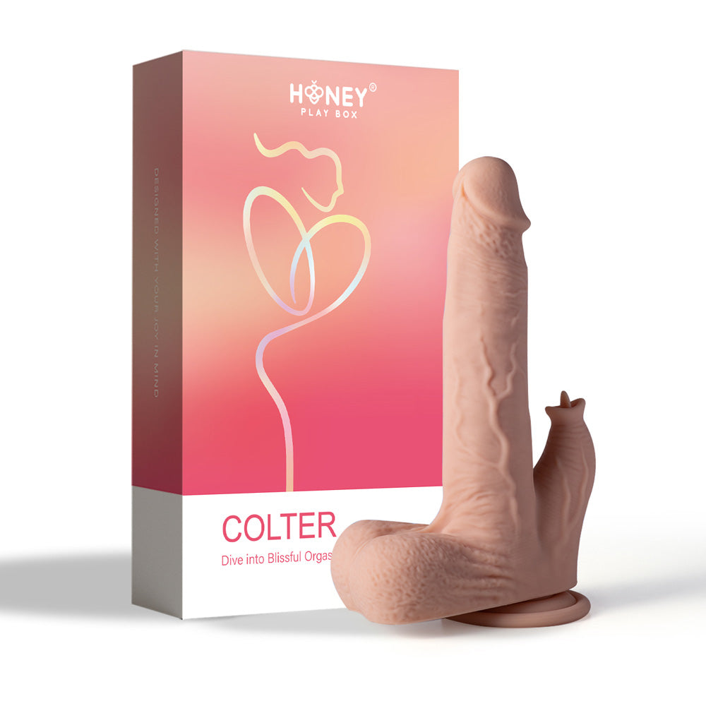 Realistic dildo with textured shaft and base, next to its pink and white box.