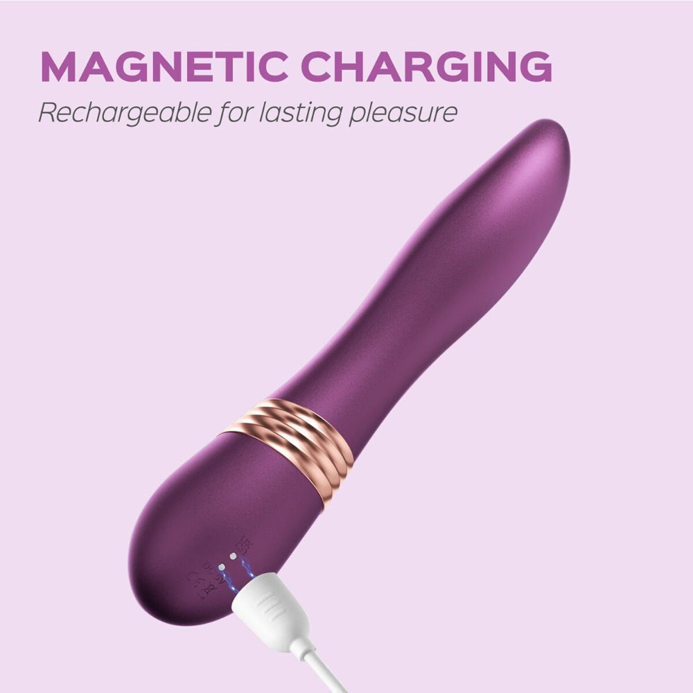 Purple magnetic charging vibrator with gold rings.