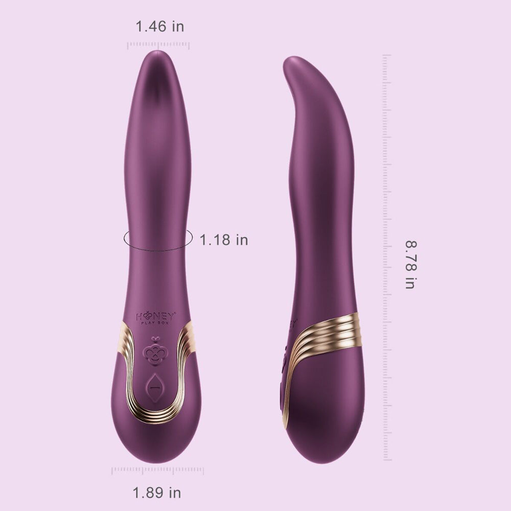 A purple silicone G-spot vibrator with dimensions labeled.