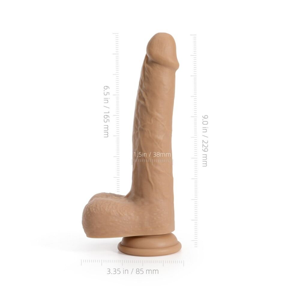 Tan silicone dildo with suction base, showing dimensions: 10 inches long, 3.34 inches wide.