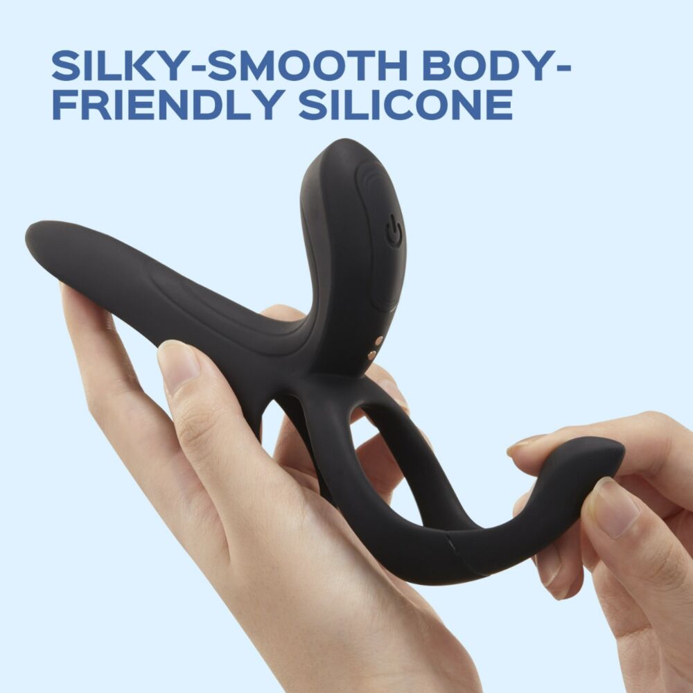 Black silicone vibrating cock ring and sleeve held by hands.