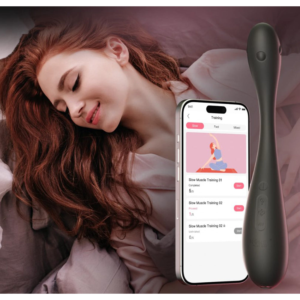 A black app-enabled inflatable kegel trainer with a woman in the background.