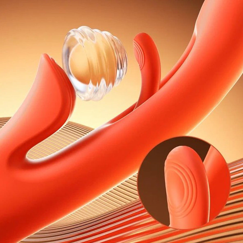 Orange rabbit vibrator with textured head and ribbed tip detail.