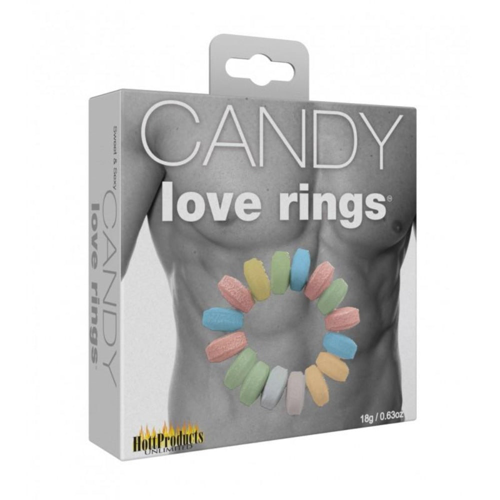 Edible candy cock rings in assorted colors arranged in a circle on a package.