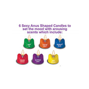 Six anus-shaped scented candles in various colors and scents.