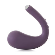 A purple, curved vibrator with a silver tip and buttons.