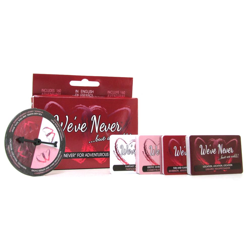 We've Never adult card game for couples with a spinner and four decks of cards.