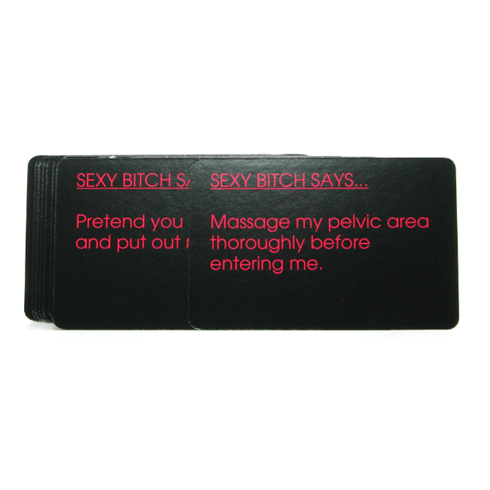 A stack of black cards with pink text, some showing "SEXY BITCH SAYS..."