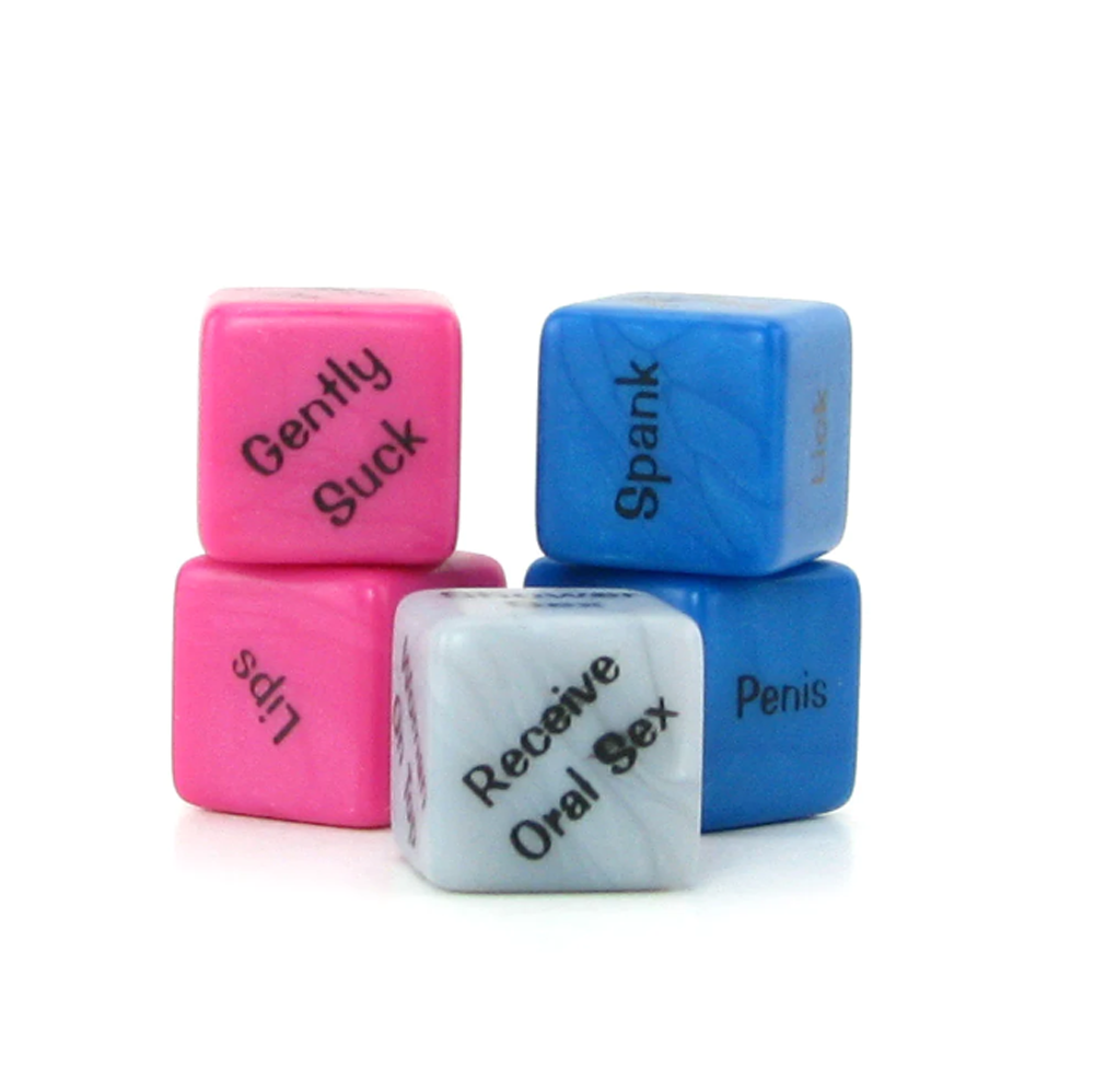 Four dice with adult themes, two pink, two blue, and one silver.