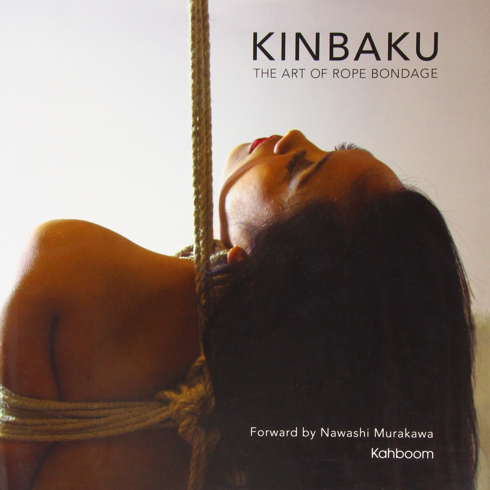 Kinbaku The Art of Rope Bondage book cover with a woman tied with rope.