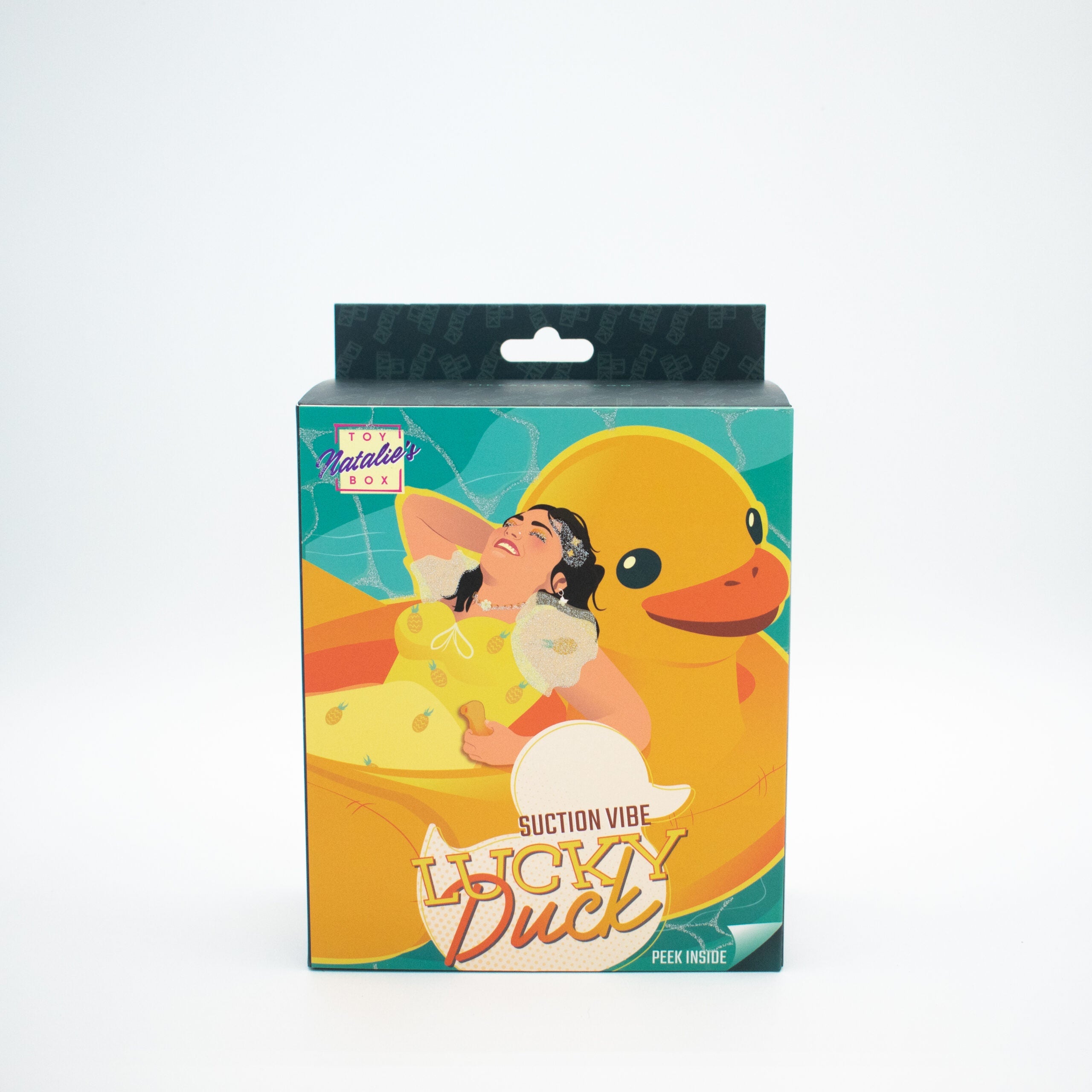 A box for the Lucky Duck suction vibe featuring a woman relaxing on a giant rubber duck.
