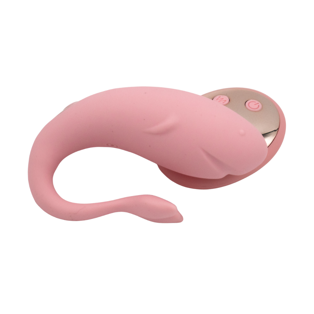 A pink whale-shaped wearable vibrator with a flexible tail and control buttons.