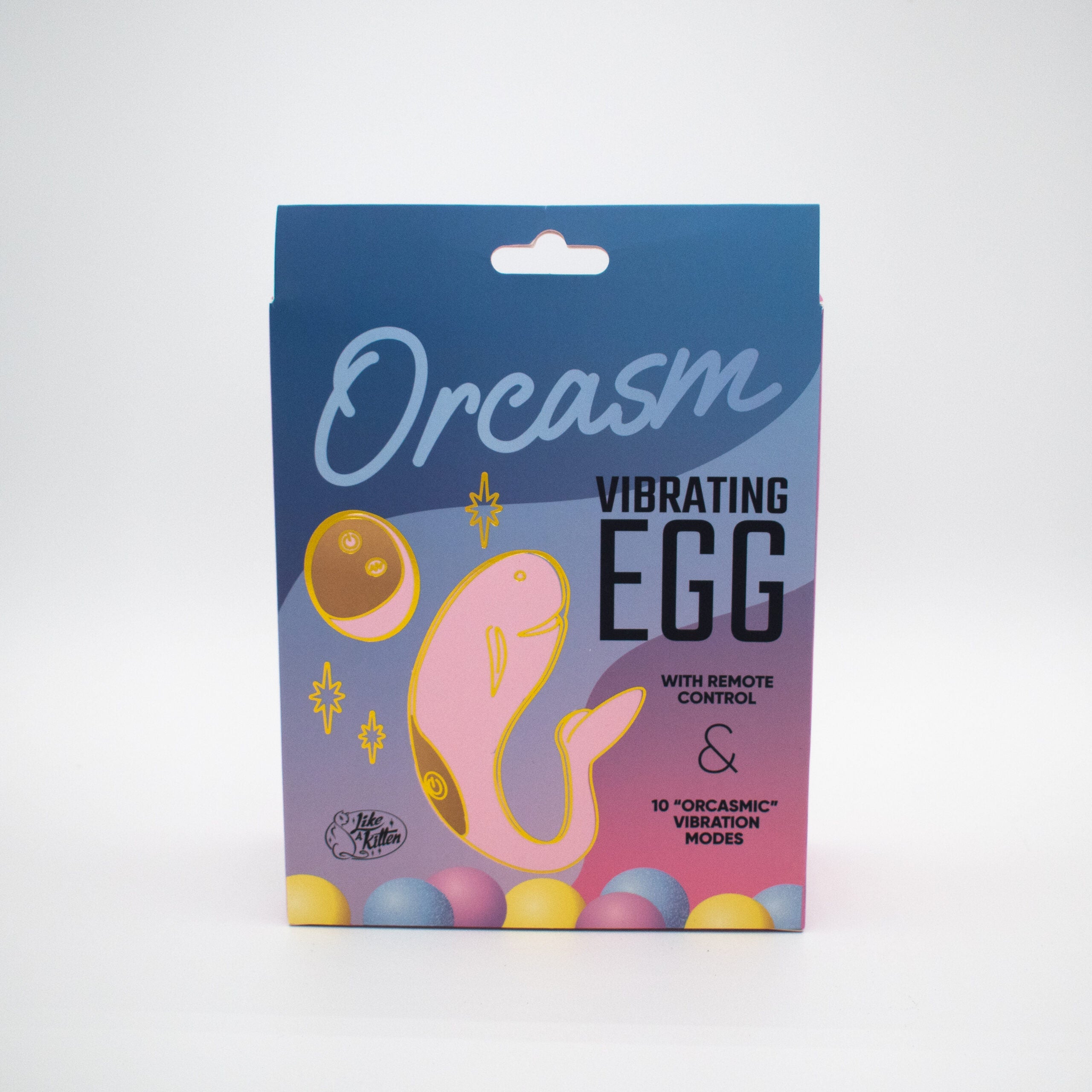 A pink vibrating egg with a remote control on its packaging.