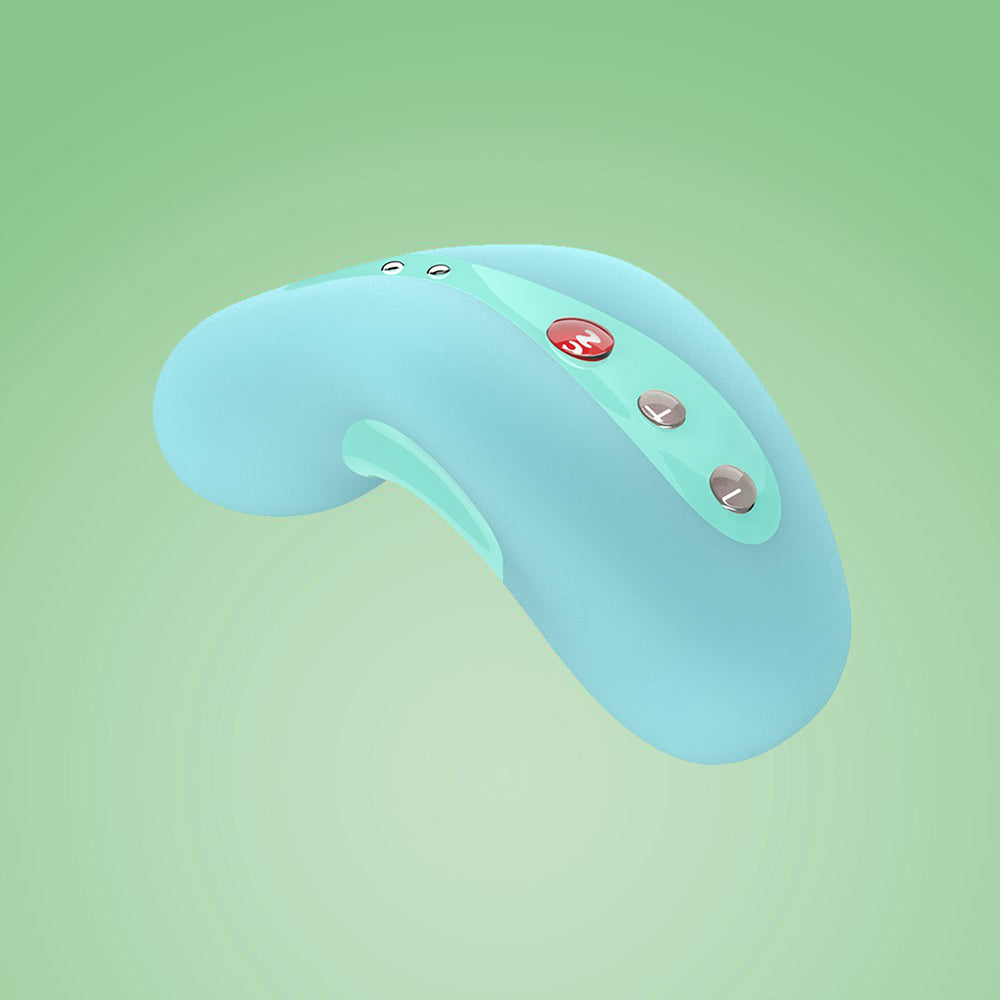 A light blue curved vibrating massager with red and grey buttons.