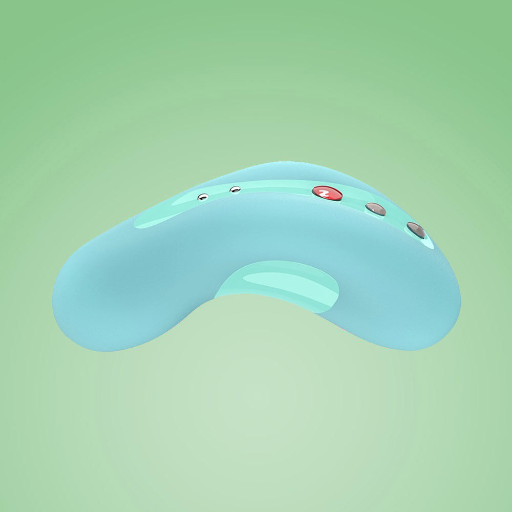 A light blue curved vibrating massager with buttons on a green background.
