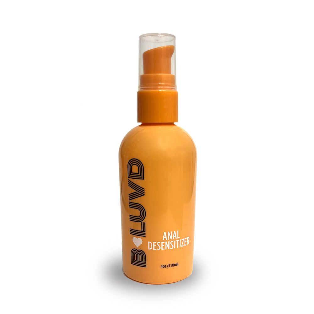 Orange bottle of anal desensitizing lubricant with a pump dispenser.