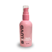 Pink bottle of B-Luvd tingling arousal gel with a pump dispenser.