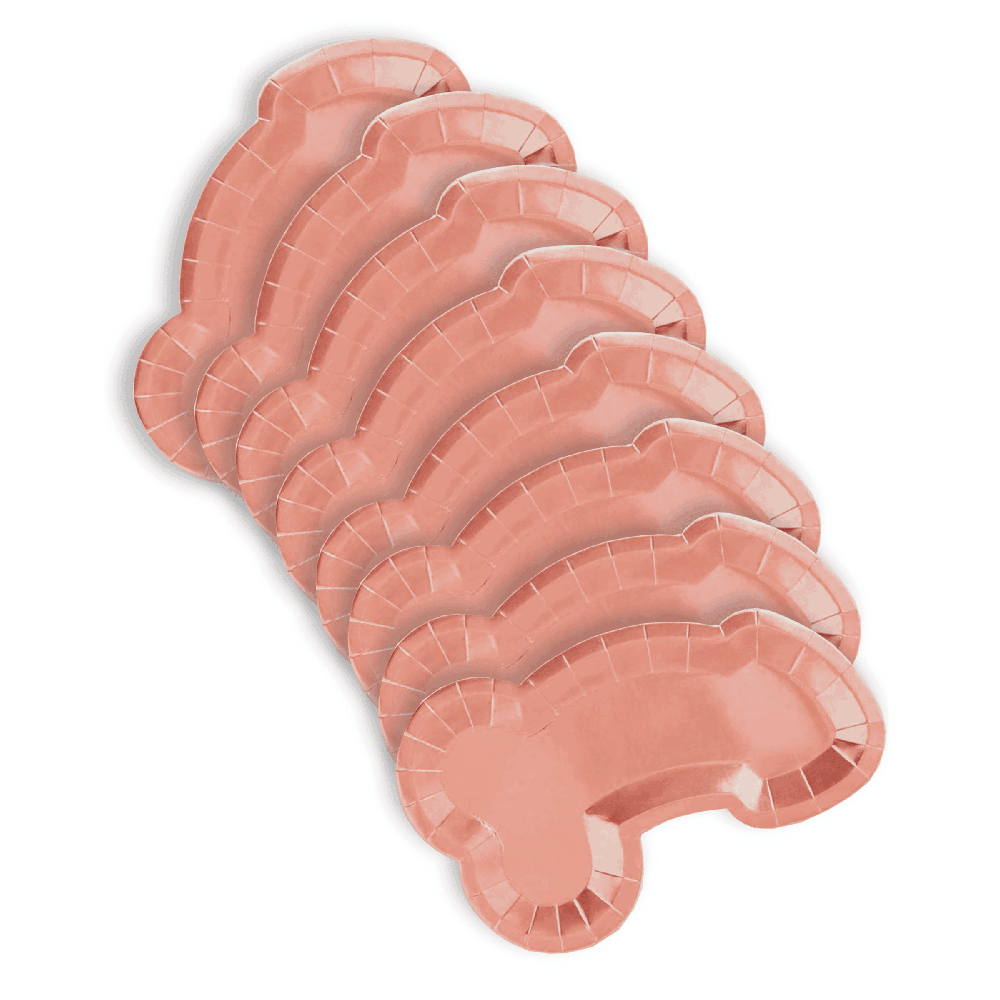 Rose gold penis-shaped paper plates stacked together.