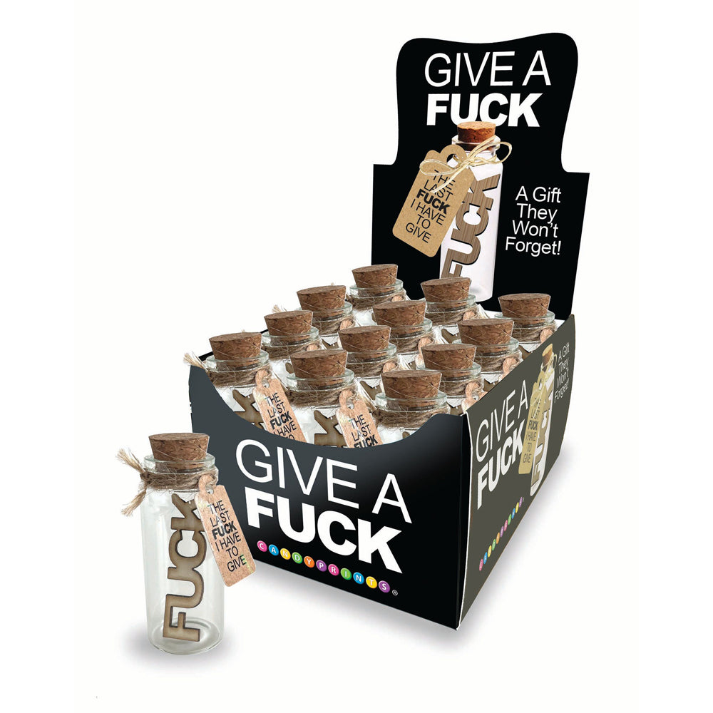 A display box of novelty jars, each containing a wooden "fuck" and labeled "The Last Fuck I Have to Give".