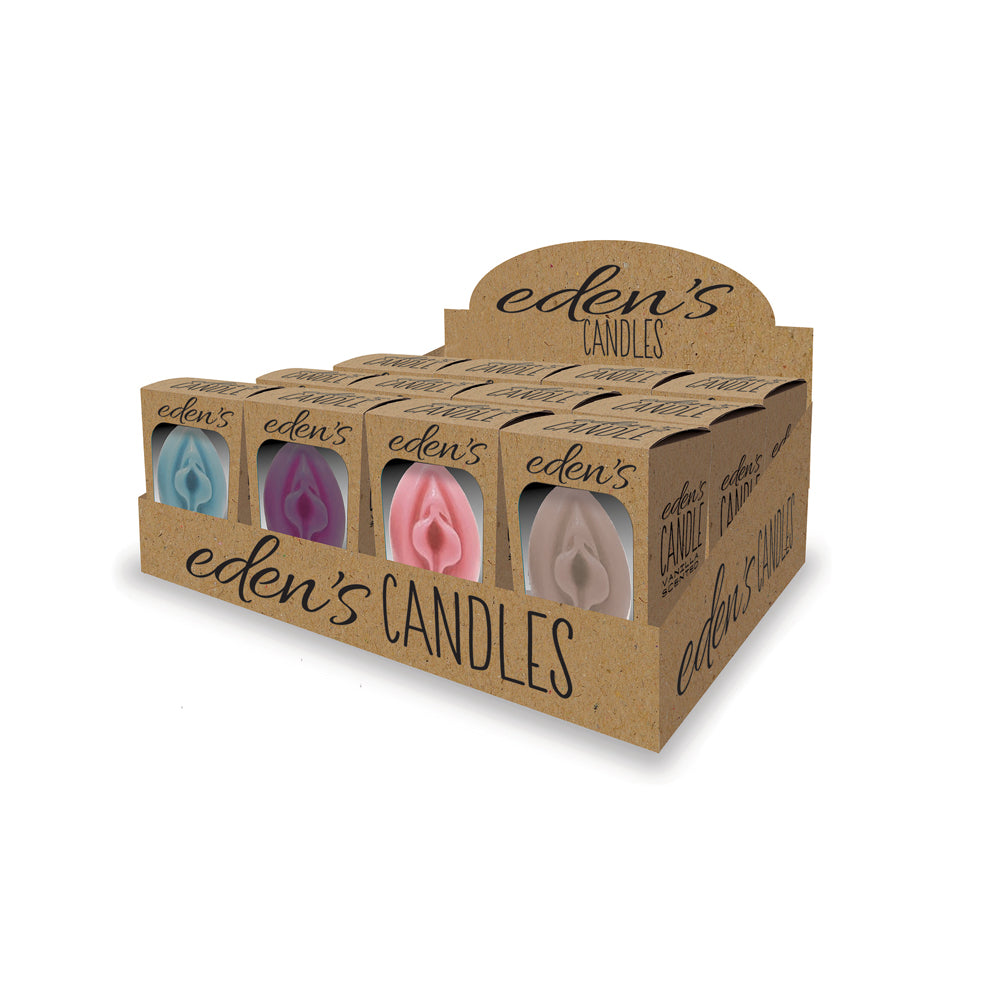 A display box of four vanilla-scented vagina candles in blue, pink, and beige.
