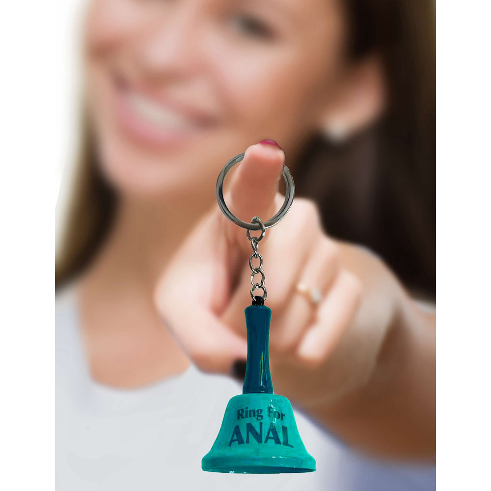 A teal novelty bell keychain with "Ring for ANAL" written on it.