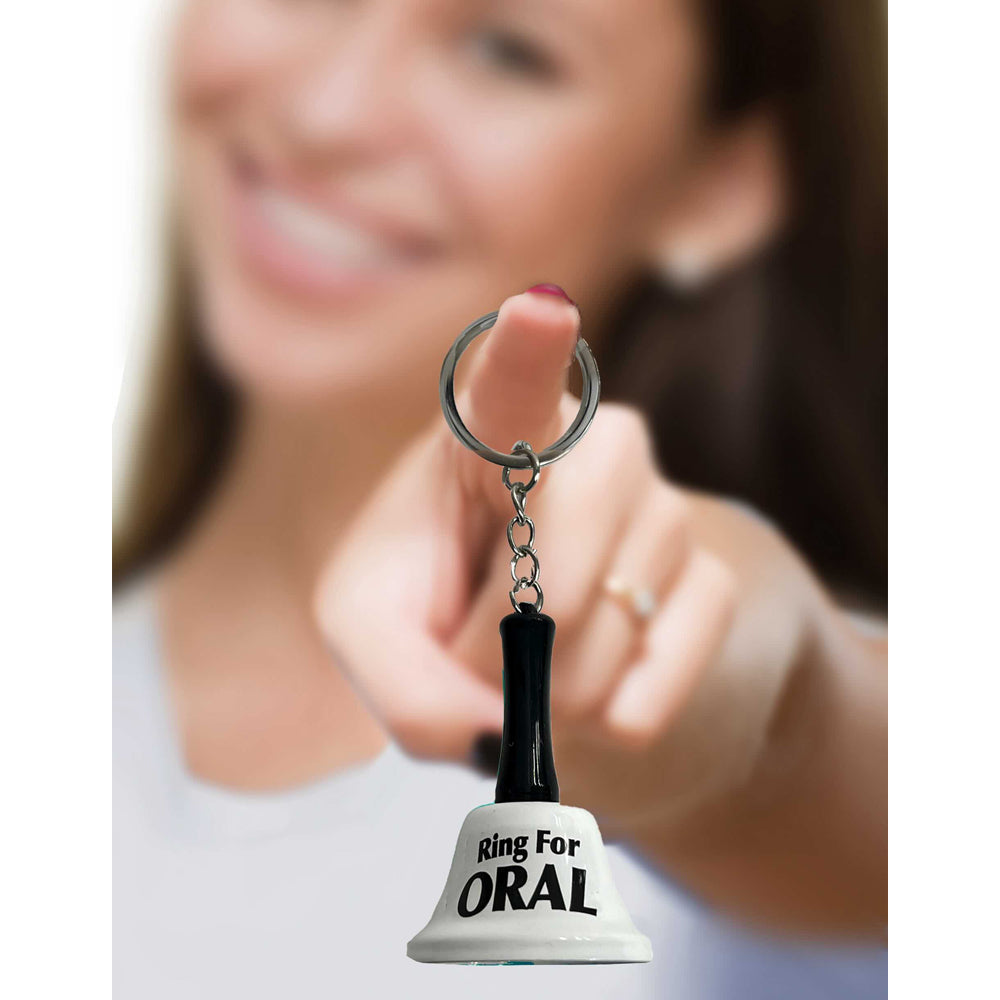 Ring for Oral novelty bell keychain with a black handle.