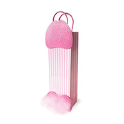 Pink penis-shaped gift bag with stripes and pink feathers.
