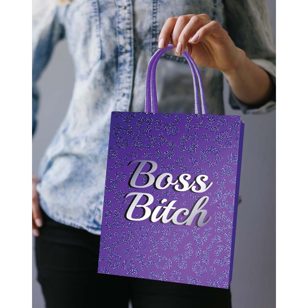 A purple gift bag with a leopard print pattern and "Boss Bitch" text.