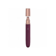 Burgundy rechargeable vibrator with rose gold cap and controls.