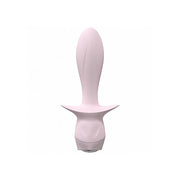 A soft pink silicone plug with a flared base and textured tip.