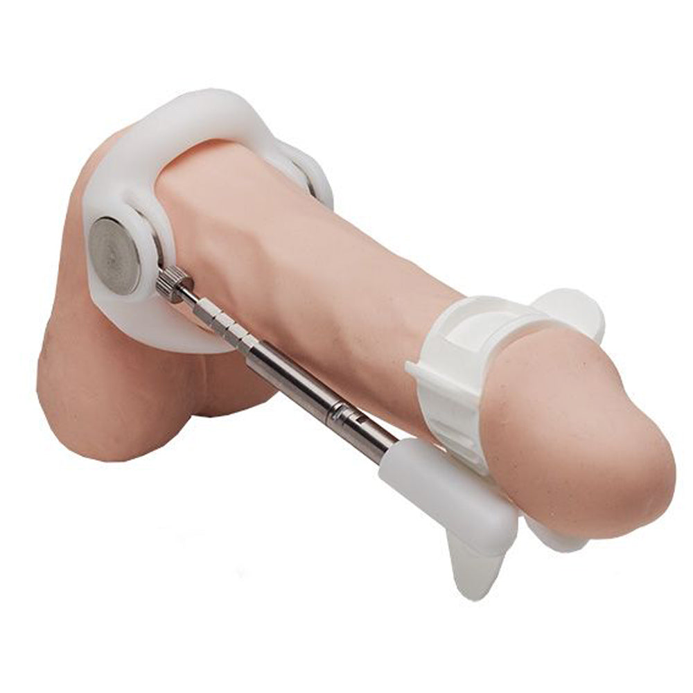 Penis extender device with white straps and metal adjustment rod.