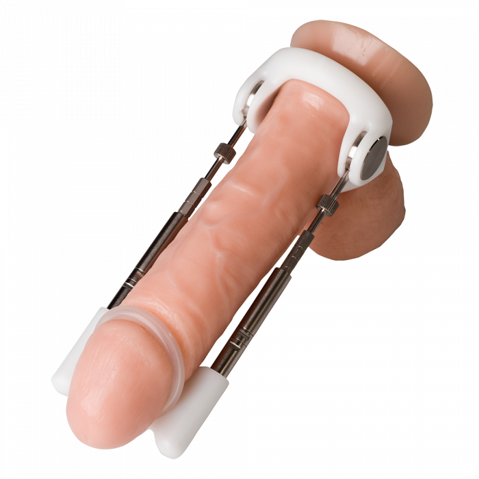 Original red penis extender with white comfort strap, silicone sleeve, and metal bars on clear background.