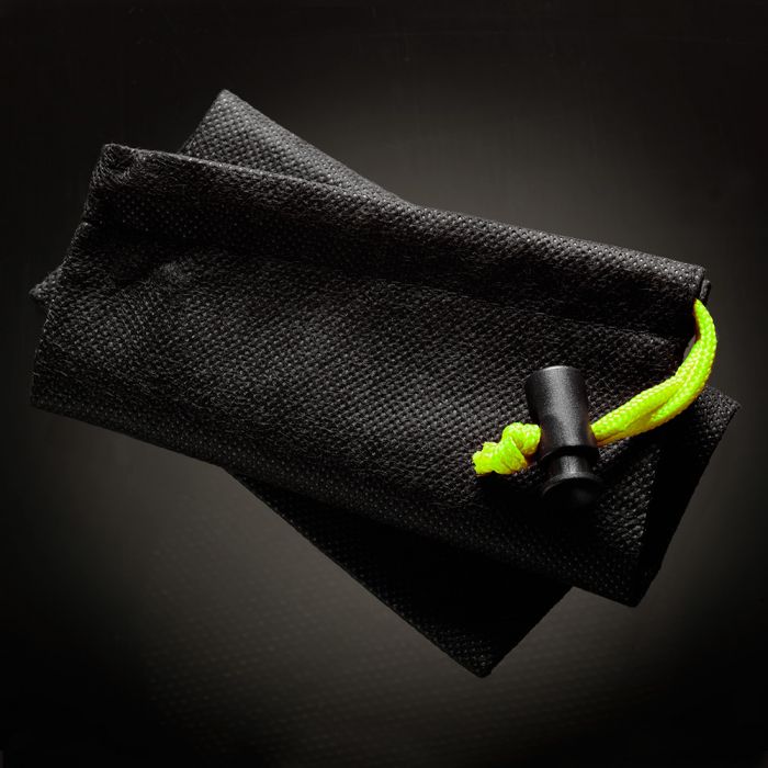 Black drawstring pouch with a neon green cord and black stopper.