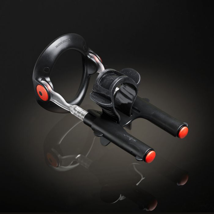 Black penis enlargement device with red accents and clear tubing.